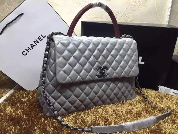 Bolsa Chanel Coco Lizard Grained Flap Handle A92992