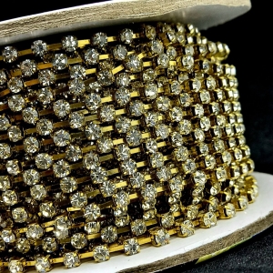 Rolo de strass SS16 cristal  com base dourada  c/ 30 jardas