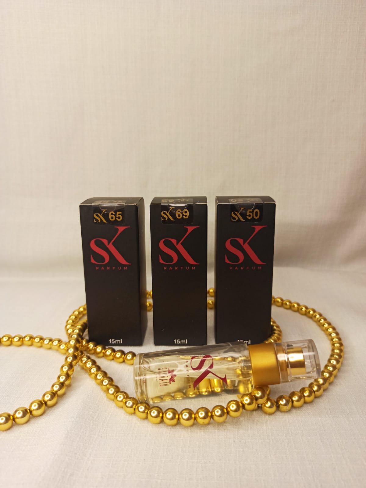 Kit com 3 perfumes femininos 15 ML - SK 65, SK 69 E SK 50
