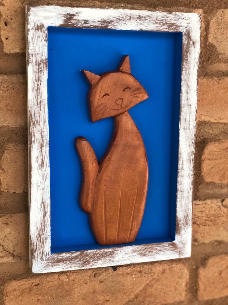 Quadro gato com fundo azul em madeira