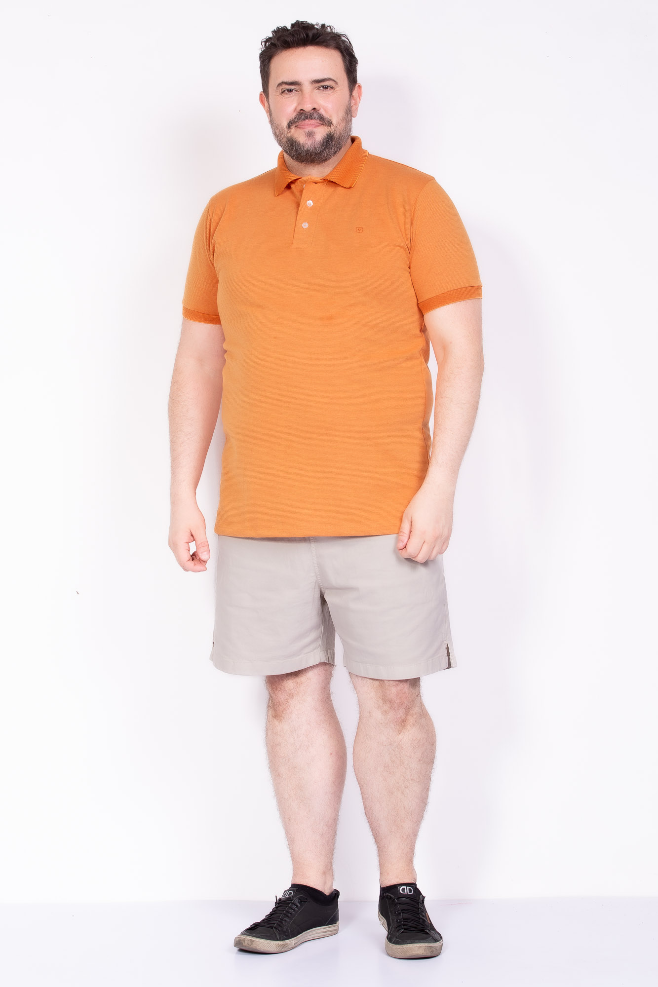 Camisa polo piquet maquinetada laranja plus size