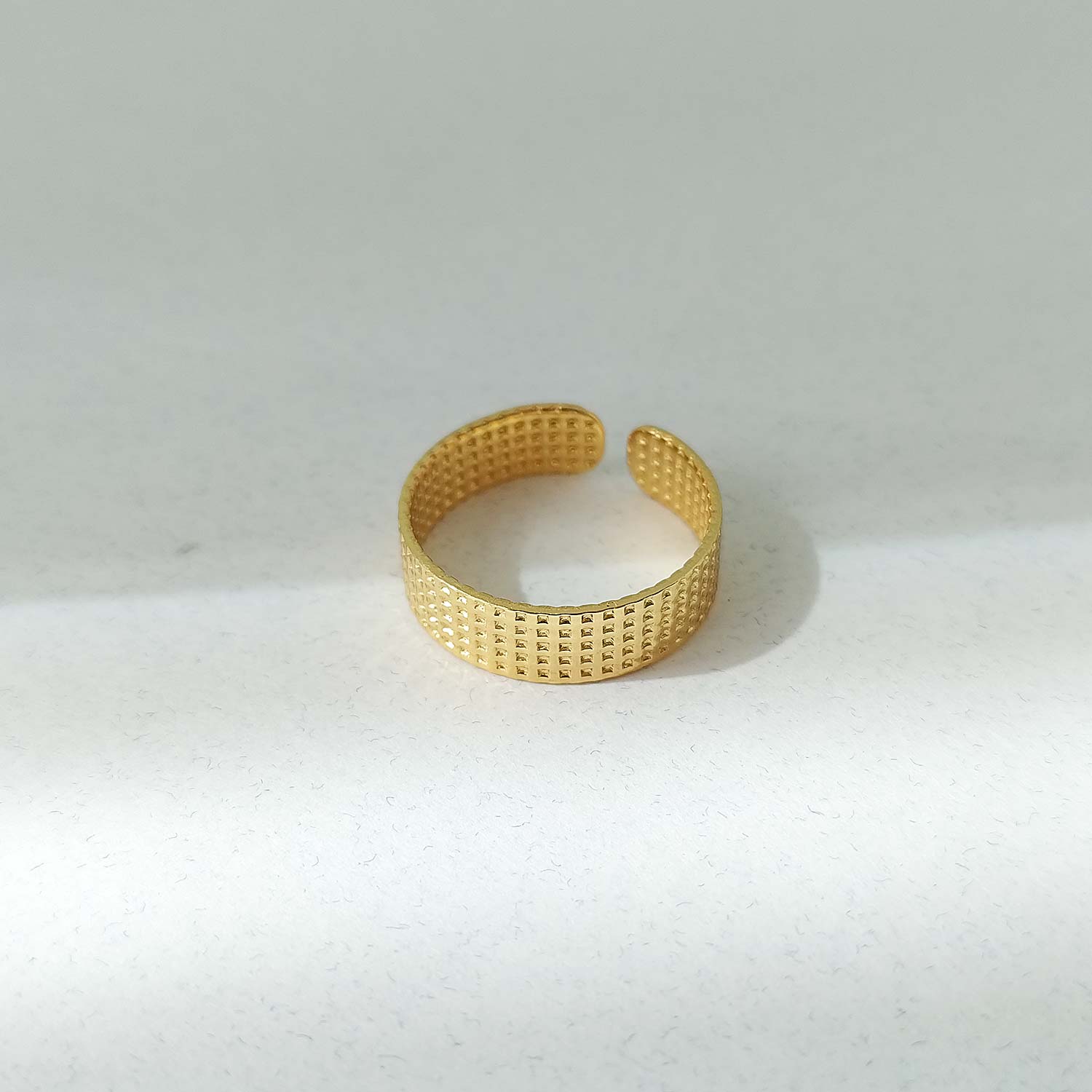 anel falange aberto textura dourado