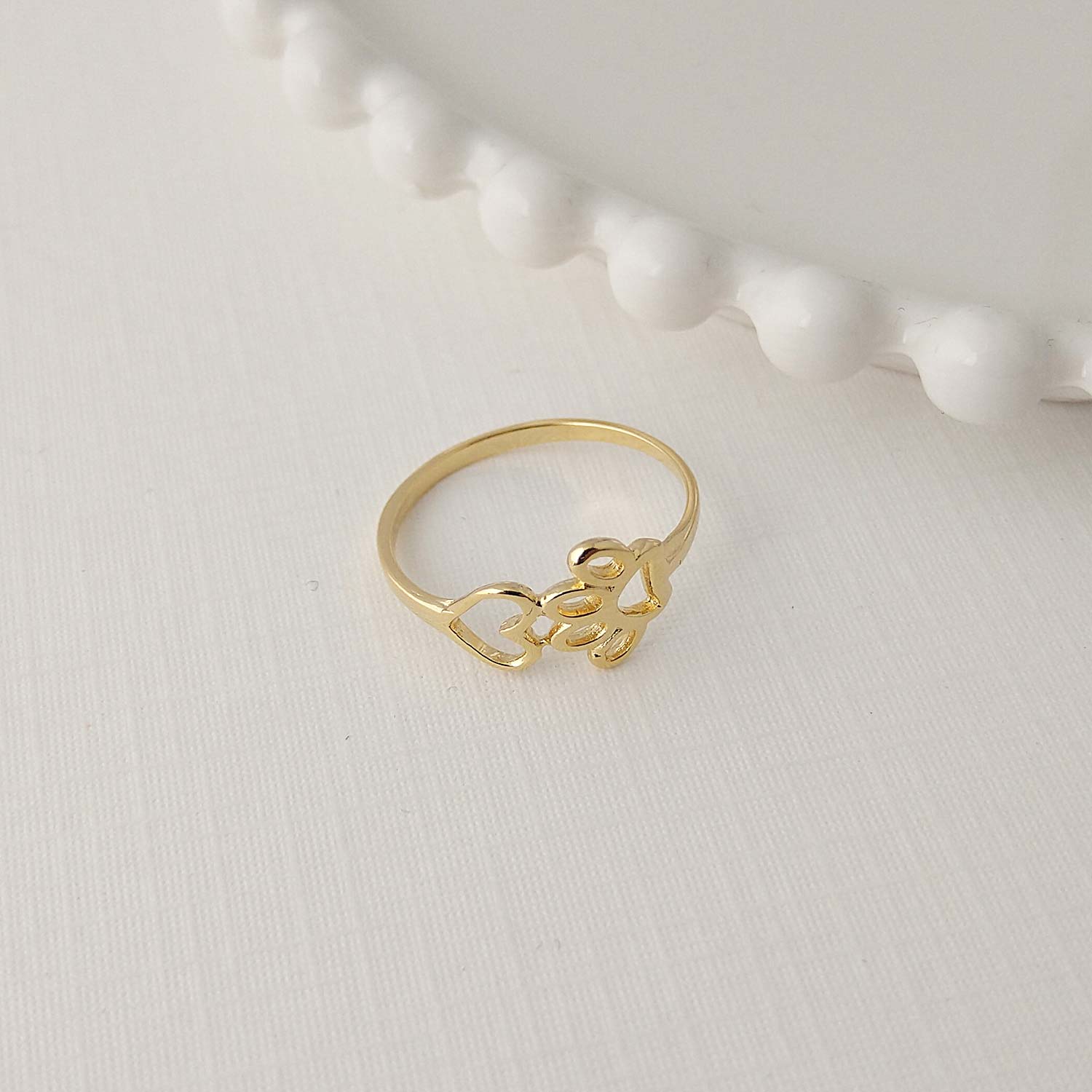 anel patinha coração liso dourado
